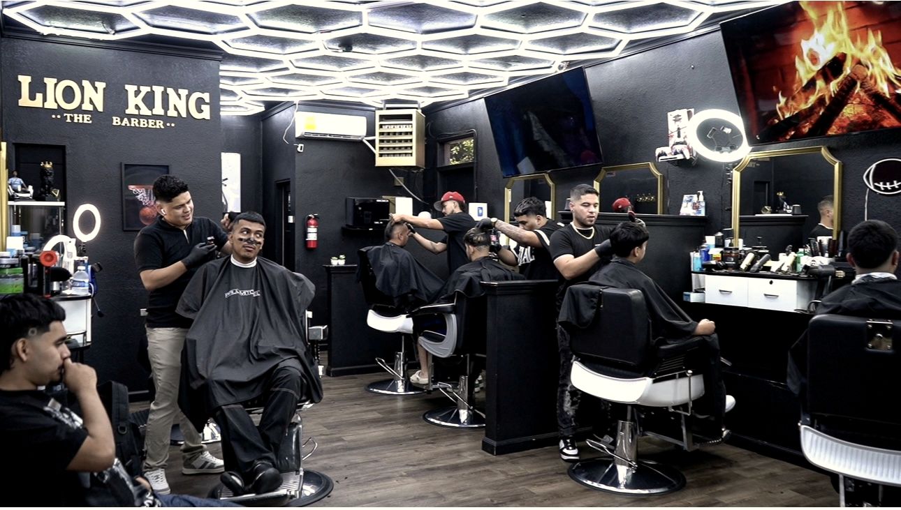 Inside The Lion King Barbershop - full chairs under the honeycomb lights